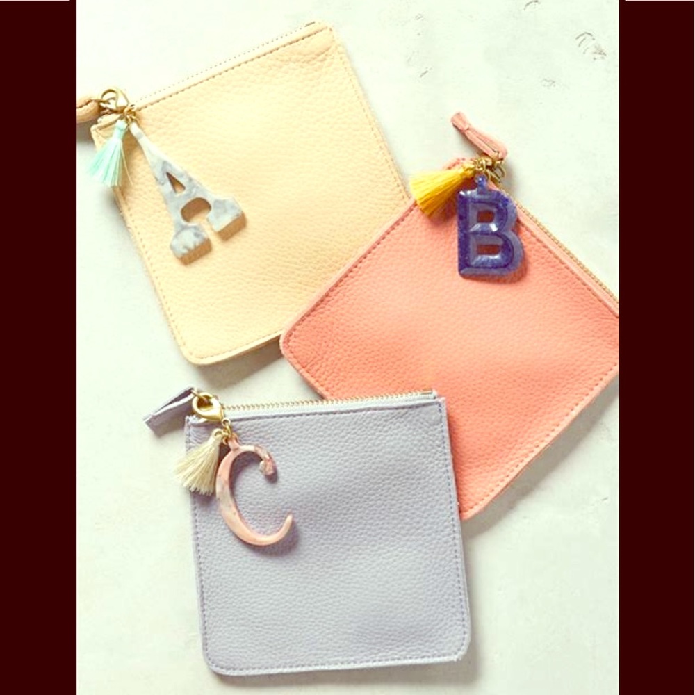 🌸🦋Anthro leather initial tassel mini purses